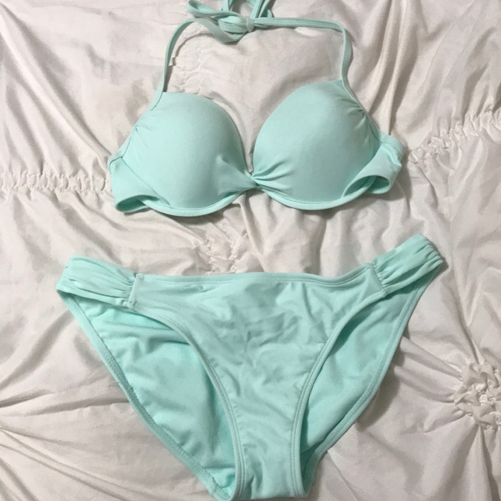 swim suit top is M bottoms are L turquoise